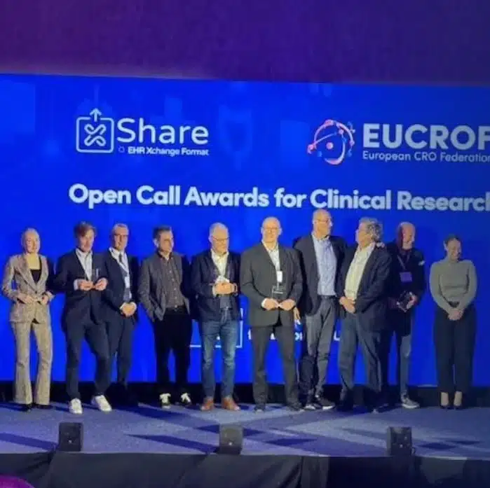 Milo Health receiving the Platinum Award at the xShare and EUCROF Open Call Awards for Clinical Research in Amsterdam